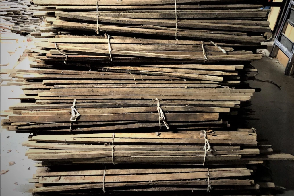 Tobacco sticks being prepared